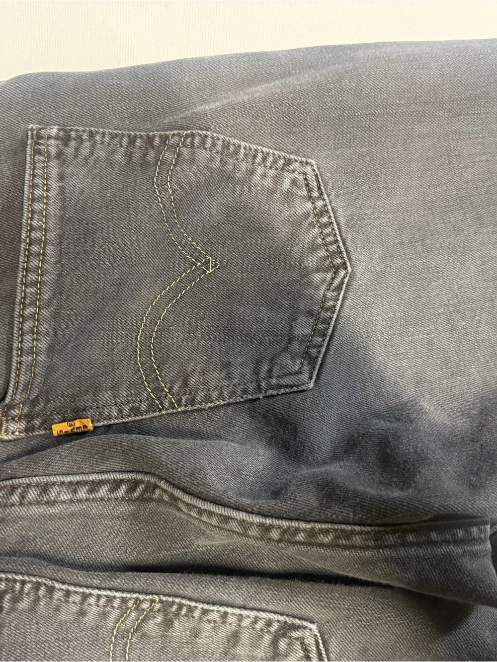 Levi's Slim Straight Jeans in Charcoal Black Orange tab